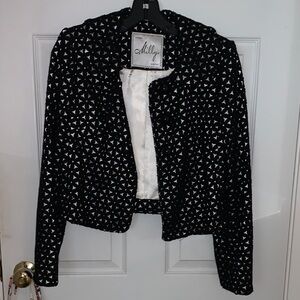 Vintage MILLY in great condition with lovely ivory lining  black cut out fabric